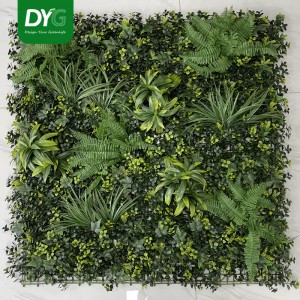 Artificial green wall panel with variegated greens and yellow foliage palms grasses ferns with yellow and white tipped foliage 100×100 cm